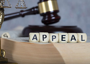 Gavel and appeal blocks—court decision on employer obligations to on-call workers.