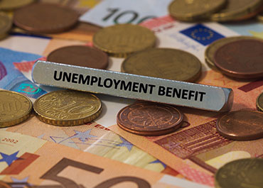 Unemployment benefits concept—misclassification of independent contractors and legal rights.